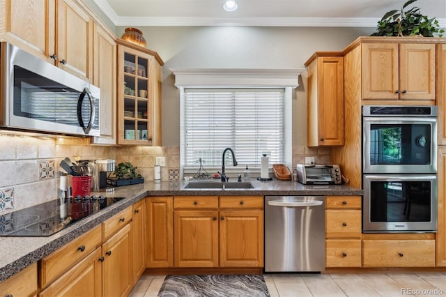 3145 Stevens Cir, Erie, CO 80516 - kitchen featuring stainless steel appliances, tasteful backsplash, glass insert cabinets, light tile patterned floors, and dark countertops