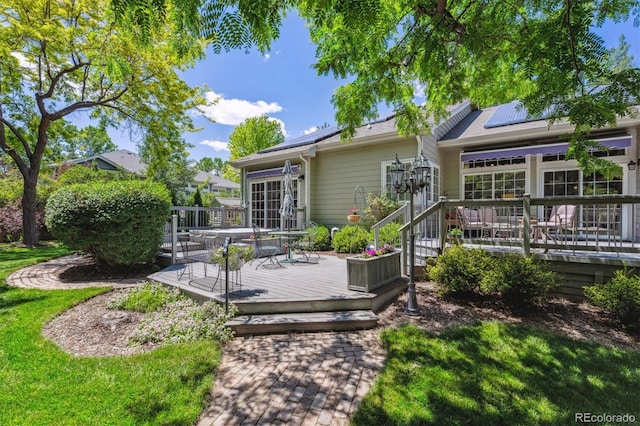 3145 Stevens Cir, Erie, CO 80516 - back of property with solar panels and a deck