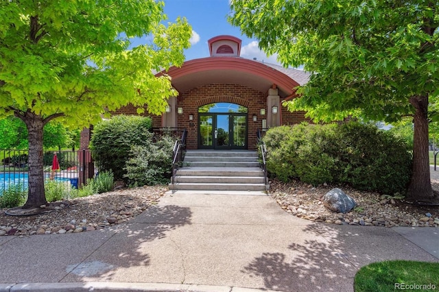 3145 Stevens Cir, Erie, CO 80516 - entrance to property featuring brick siding and french doors