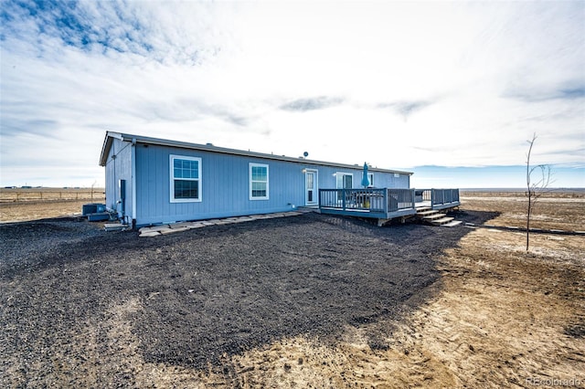 view of front of home with a wooden deck