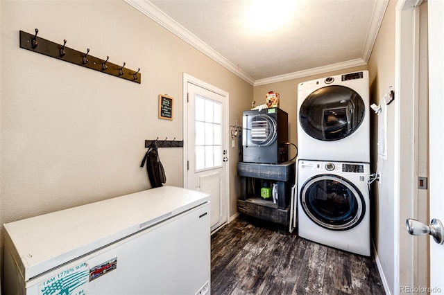 laundry area with stacked washing maching and dryer, dark wood-type flooring, and crown molding