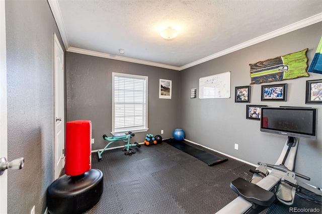 workout area featuring crown molding and a textured ceiling