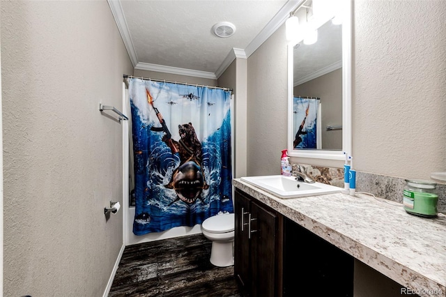 bathroom featuring ornamental molding, toilet, wood-type flooring, and vanity