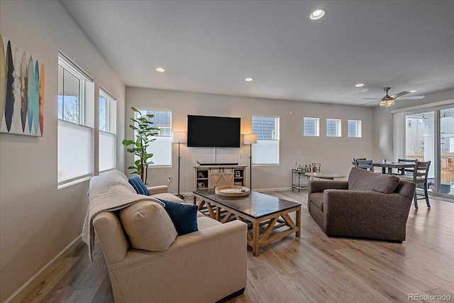 living room with light hardwood / wood-style floors