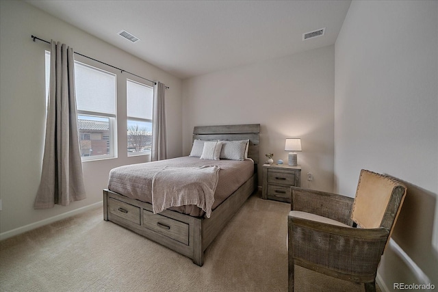 bedroom featuring light carpet