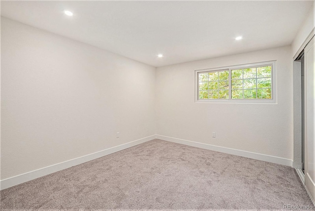 unfurnished room with carpet