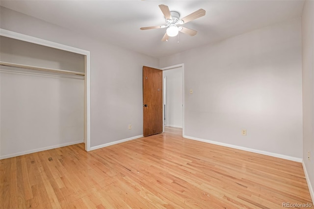 305 Titan St, Aurora, CO 80011 - unfurnished bedroom featuring baseboards, light wood-style floors, a closet, and ceiling fan