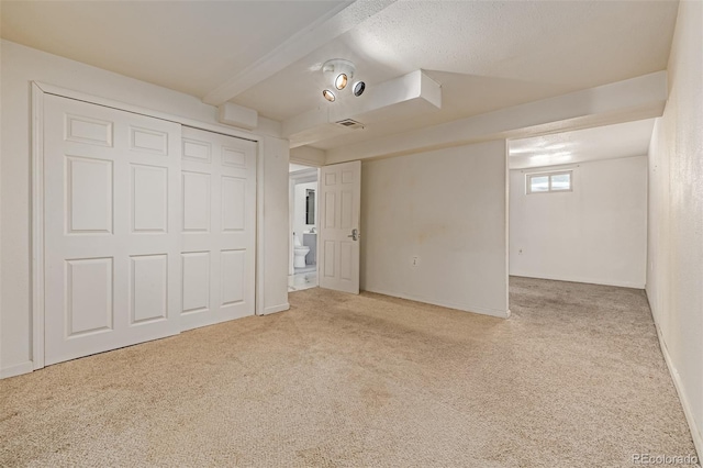 305 Titan St, Aurora, CO 80011 - unfurnished bedroom featuring carpet floors and baseboards