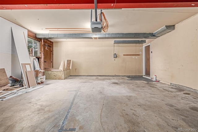 305 Titan St, Aurora, CO 80011 - garage featuring a garage door opener