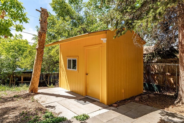 305 Titan St, Aurora, CO 80011 - view of shed with a fenced backyard