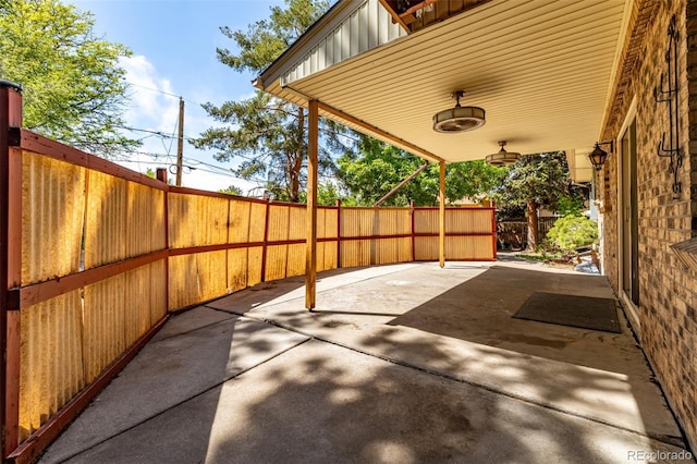 305 Titan St, Aurora, CO 80011 - fenced backyard with a patio area