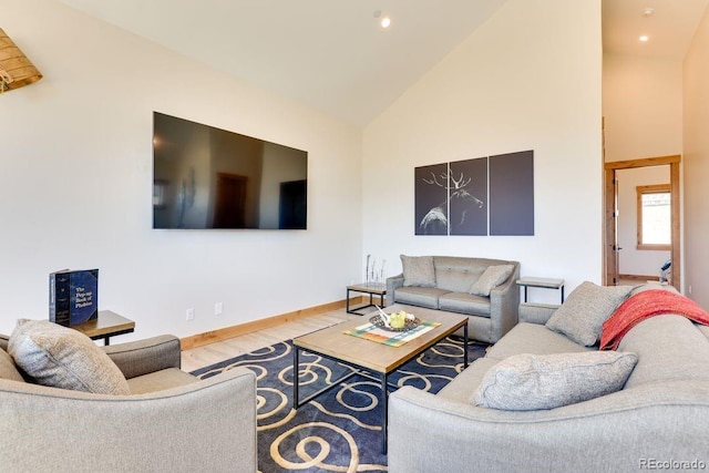 148 Hay Meadow Dr, Fraser, CO 80442 - living area featuring wood finished floors, high vaulted ceiling, and recessed lighting