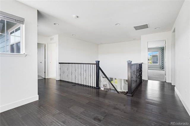 15378 W 50th Pl, Golden, CO 80403 - corridor featuring an upstairs landing, wood finished floors, and recessed lighting