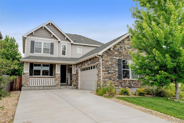 8071 Tabor St, Arvada, CO 80005 - craftsman-style house featuring a porch, stone siding, a garage, driveway, and roof with shingles