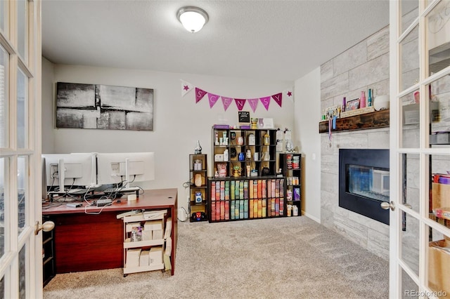 8071 Tabor St, Arvada, CO 80005 - carpeted office with french doors and a fireplace