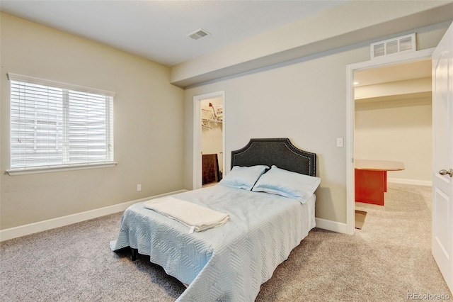 8071 Tabor St, Arvada, CO 80005 - carpeted bedroom featuring baseboards and a spacious closet