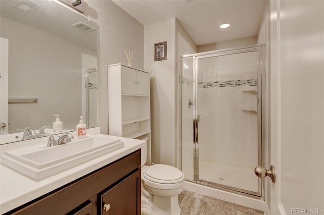 8071 Tabor St, Arvada, CO 80005 - full bathroom featuring a stall shower, vanity, tile patterned flooring, and recessed lighting