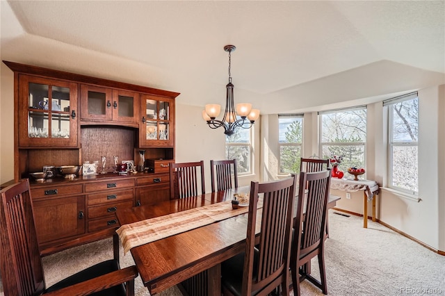 2369 Bayberry Ln, Castle Rock, CO 80104 - dining area featuring light carpet, a chandelier, and baseboards