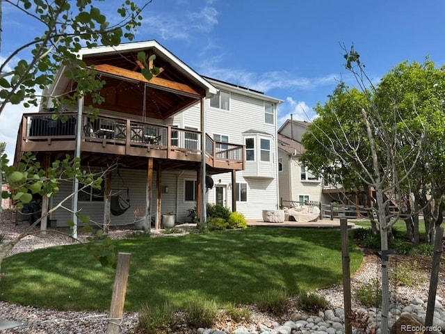 2369 Bayberry Ln, Castle Rock, CO 80104 - rear view of house with a lawn and a deck