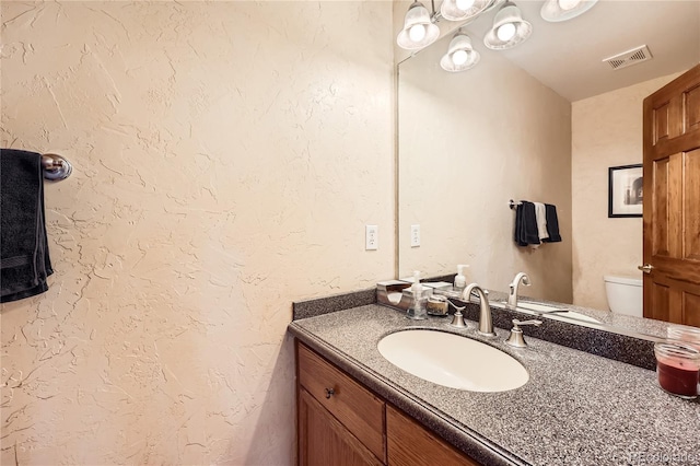 2369 Bayberry Ln, Castle Rock, CO 80104 - bathroom featuring vanity and toilet