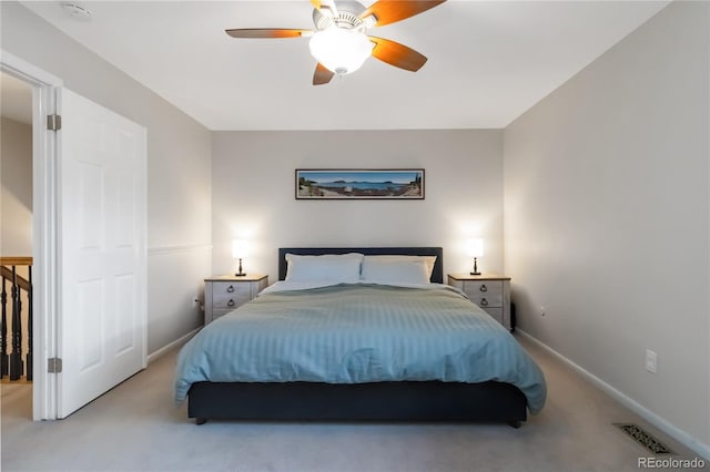 1768 E Jamison Ave, Centennial, CO 80122 - bedroom with light colored carpet, baseboards, and a ceiling fan