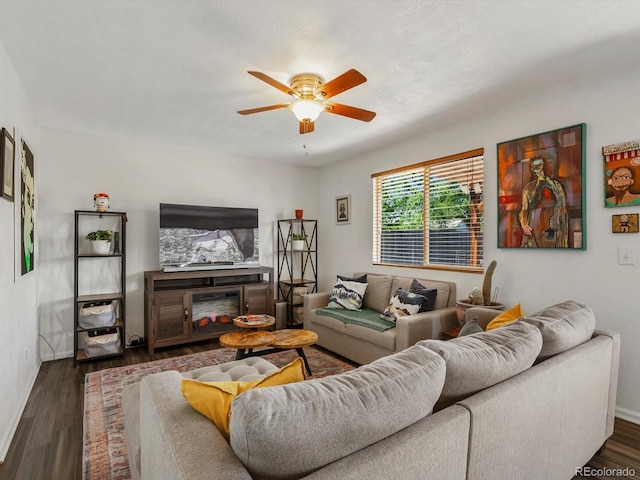2006 E 97th Ave, Thornton, CO 80229 - living area with ceiling fan, baseboards, and dark wood-type flooring
