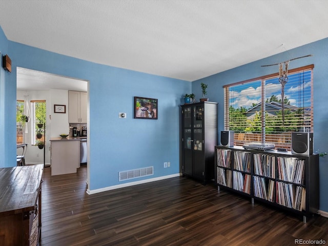 2006 E 97th Ave, Thornton, CO 80229 - spare room with wood finished floors and baseboards