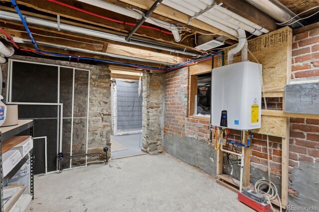 basement featuring tankless water heater