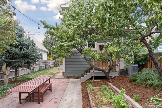 view of patio featuring central AC unit