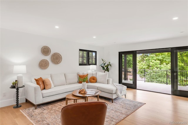 4452 Xavier St, Denver, CO 80212 - living room with light wood-style flooring and recessed lighting