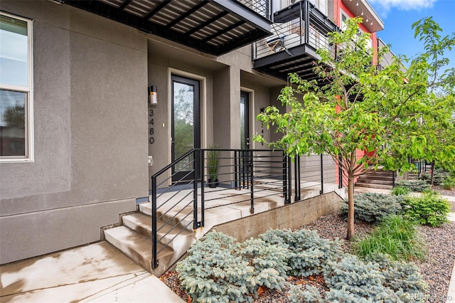 3480 E 31st Ave, Denver, CO 80205 - doorway to property featuring stucco siding