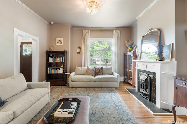 3424 W 31st Ave, Denver, CO 80211 - living area with ornamental molding, light wood-style floors, and a fireplace