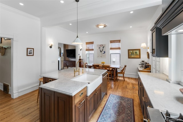 3424 W 31st Ave, Denver, CO 80211 - kitchen with a sink, dishwasher, light wood-style flooring, ornamental molding, and baseboards