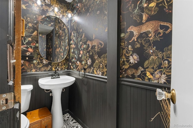 3424 W 31st Ave, Denver, CO 80211 - bathroom featuring toilet and wainscoting