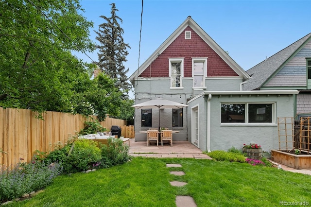 3424 W 31st Ave, Denver, CO 80211 - rear view of property featuring a patio and stucco siding