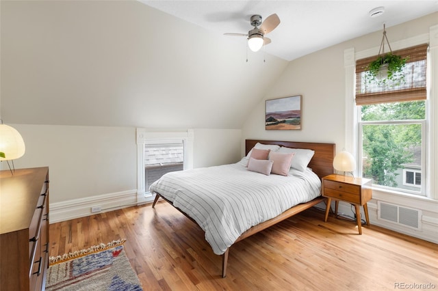 3424 W 31st Ave, Denver, CO 80211 - bedroom with lofted ceiling, light wood-style flooring, a ceiling fan, and baseboards