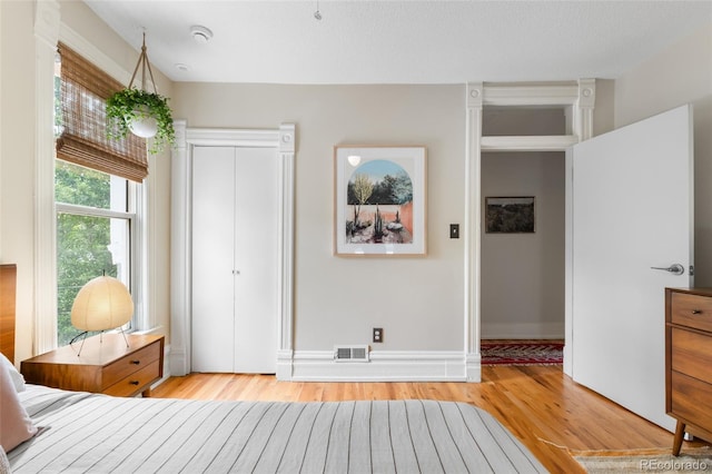 3424 W 31st Ave, Denver, CO 80211 - bedroom featuring light wood finished floors and a closet