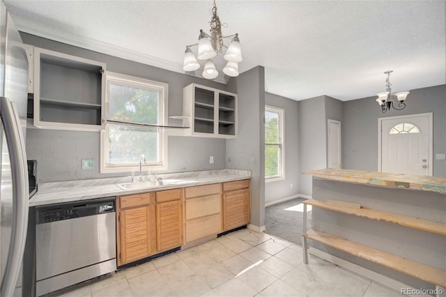 kitchen with dishwasher, a textured ceiling, a chandelier, and light brown cabinetry