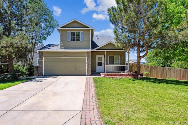 5441 Lynx St, Frederick, CO 80504 - view of front of home featuring covered porch, driveway, a garage, and a shingled roof