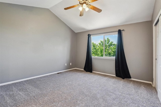 5441 Lynx St, Frederick, CO 80504 - spare room with ceiling fan, lofted ceiling, carpet flooring, and baseboards