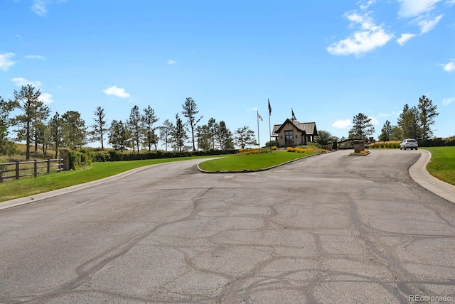 view of street with curbs