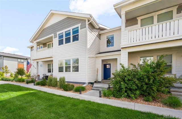 2078 Autumn Moon Dr Unit 3, Windsor, CO 80550 - multi unit property featuring a balcony and a front yard