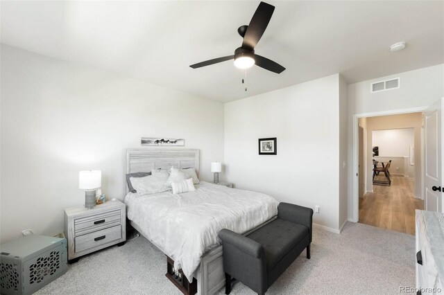 2078 Autumn Moon Dr Unit 3, Windsor, CO 80550 - bedroom with a ceiling fan and light colored carpet