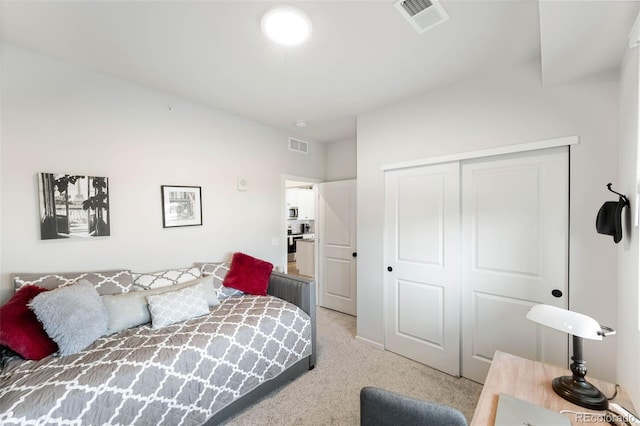 2078 Autumn Moon Dr Unit 3, Windsor, CO 80550 - bedroom with light colored carpet and a closet
