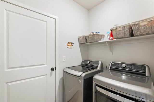 2078 Autumn Moon Dr Unit 3, Windsor, CO 80550 - laundry room featuring washer and clothes dryer