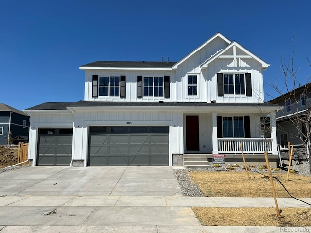 283 Wooten Ave, Brighton, CO 80601 - modern farmhouse style home with board and batten siding, a porch, driveway, and a garage