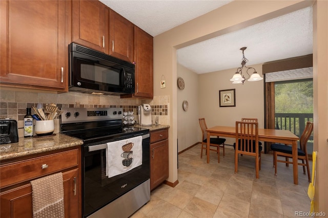 300 Sterling Way Unit 3, Fraser, CO 80442 - kitchen with black microwave, stainless steel electric range, backsplash, a chandelier, and hanging light fixtures