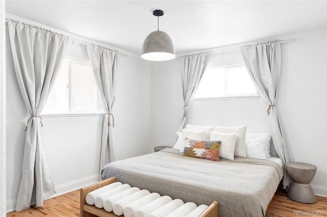 2313 S Race St Unit A, Denver, CO 80210 - bedroom featuring wood finished floors and baseboards