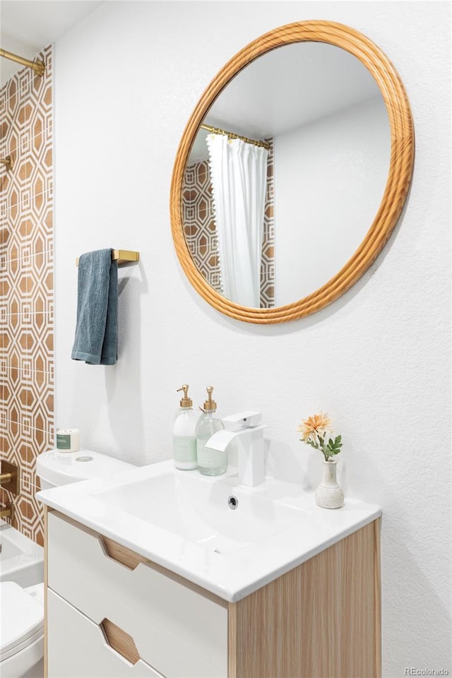 2313 S Race St Unit A, Denver, CO 80210 - bathroom with vanity and toilet