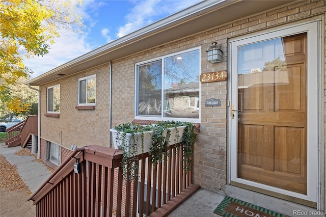 2313 S Race St Unit A, Denver, CO 80210 - view of exterior entry featuring brick siding